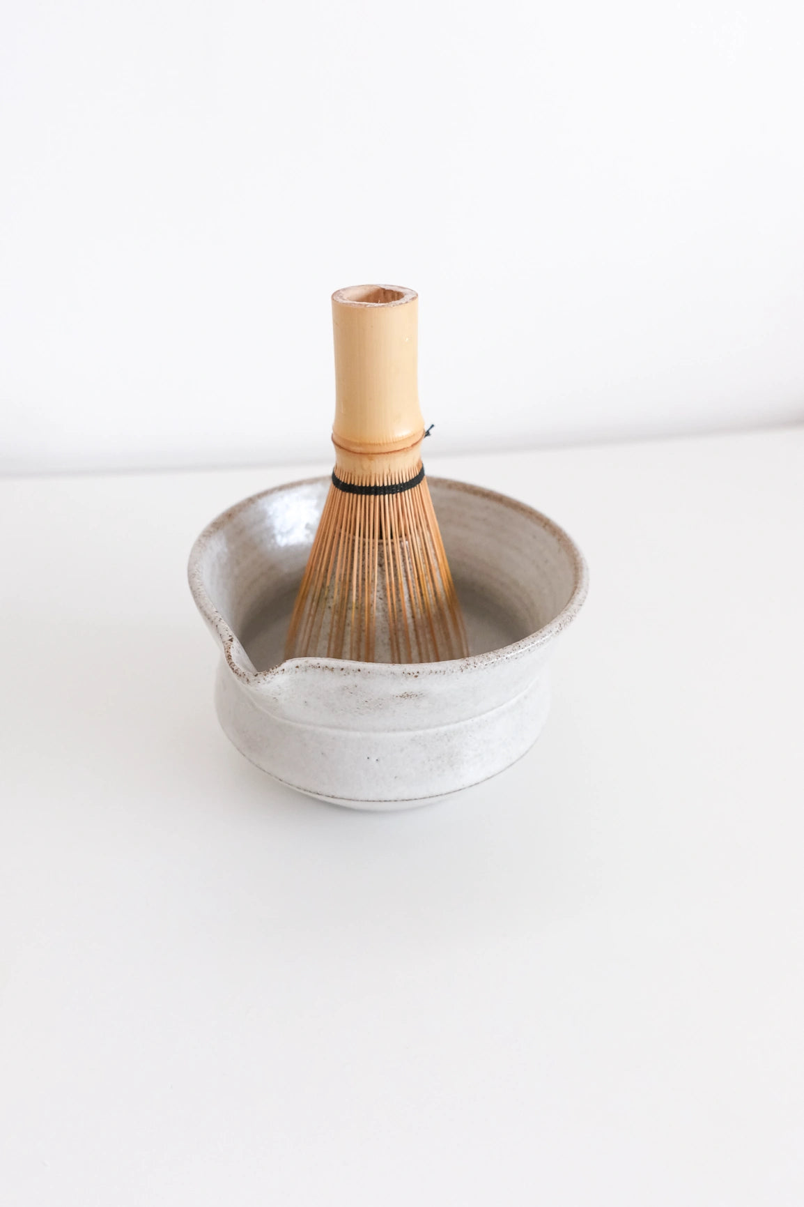 Matcha Chawan bowl Thea Studio Foon white glazed with chasen bamboo whisk